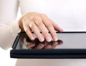 Woman Reading from a Tablet