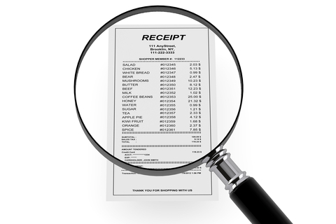 Receipt and Magnifying Glass