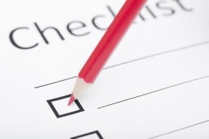 Checklist with pencil checking a box