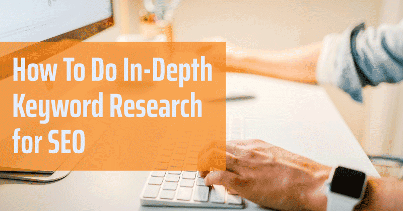 Professional typing on keyboard doing keyword research.