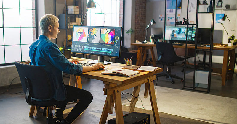 content creator optimizing content on desktop computer.