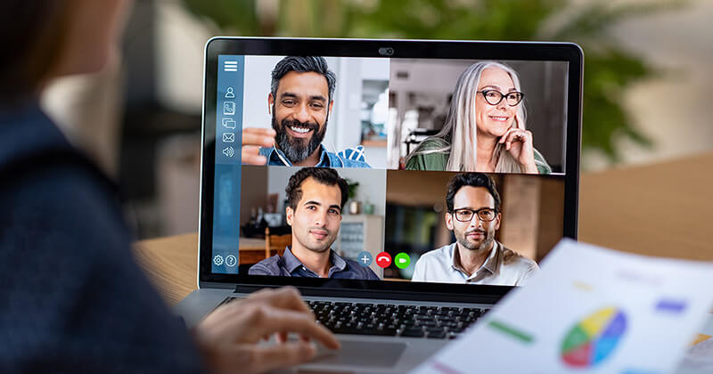 woman presenting data and analytics in a virtual meeting with stakeholders.