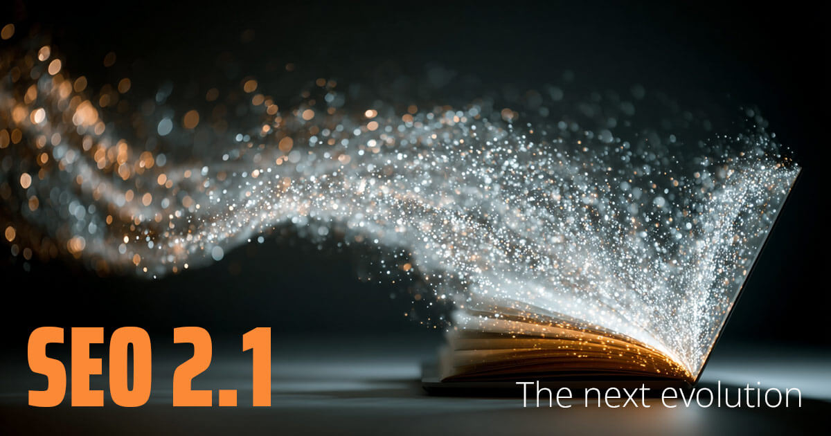 laptop emanating sparkling light and digital energy illuminating the open pages of a book. Text overlay: SEO 2.1, the next evolution.