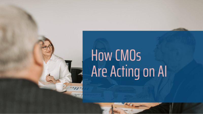 Senior executives in a boardroom meeting with an overlaid headline reading “How CMOs Are Acting on AI,” illustrating leadership discussion and strategic decision-making around artificial intelligence in marketing.